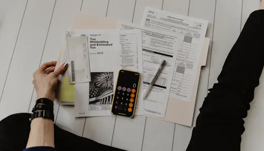 Tax return documents and a calculator