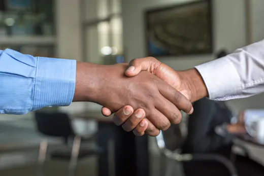 Handshake confirming a deal